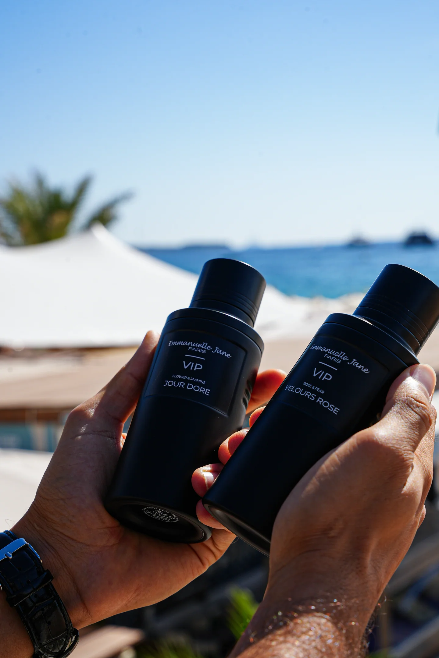 Jour Doré and Velours Rose held in the hands overlooking the sea in Cannes